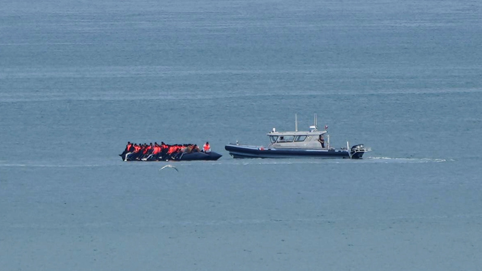 1 person dies when a boat overloaded with migrants sinks in the English Channel
