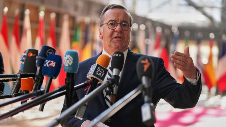 German defense minister says draft could return if volunteer numbers fall short