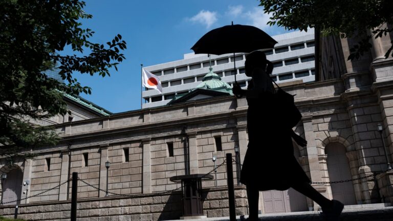 BOJ to slow bond purchases, holds rates at 0.5%