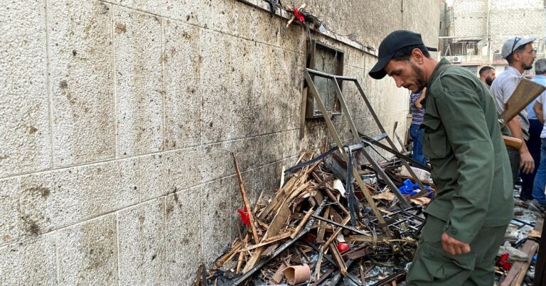 Suicide bomber at Syrian church kills at least 13