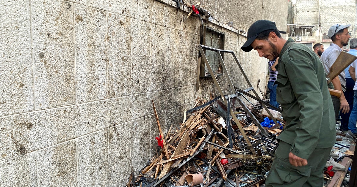 Suicide bomber at Syrian church kills at least 13