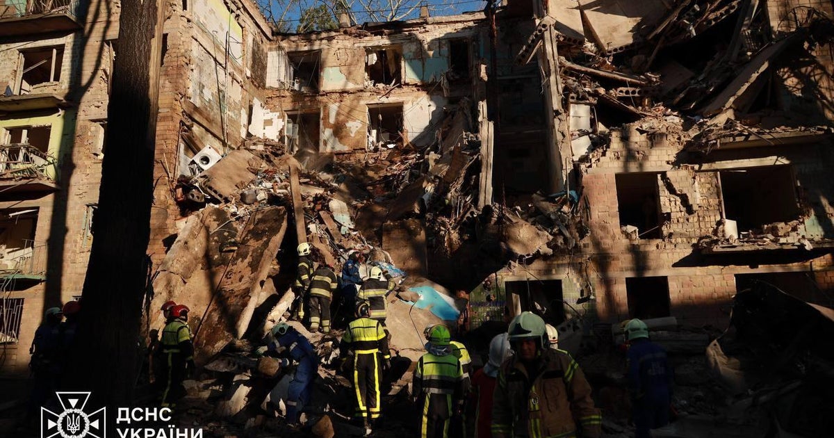 Russian strike on Ukraine's capital kills 5, with more possibly trapped under damaged Kyiv apartment building