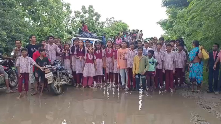 students-in-telanganas-komaram-bheem-asifabad-protest-muddy-rain-damaged-road-officials-promise-r-040549700-16x9_0.png
