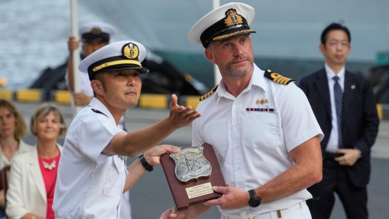 Japan says security ties with the UK at 'a new level' as aircraft carrier arrives in Tokyo