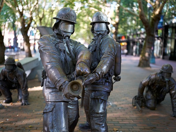 Seattle_firefighter_statue_in_pioneer_square.jpeg
