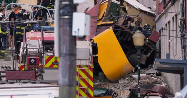 Lisbon funicular crash kills at least 15 people when popular streetcar derails