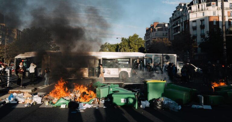Protests in Paris and across France seek to "block everything," leading to nearly 200 arrests