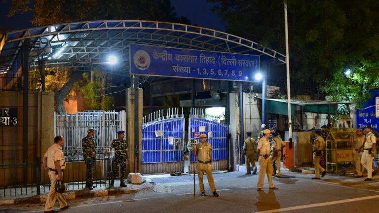 police-personnel-stand-guard-outside-the-tihar-jail-photo-ptifile-064800289-16x9_0.jpg