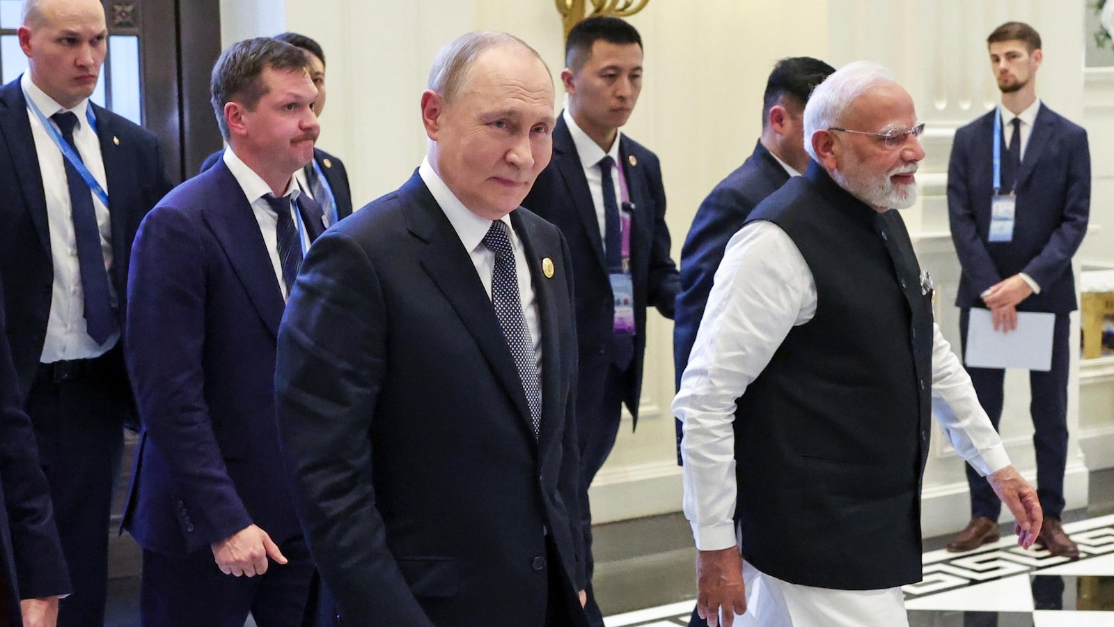 Modi and Putin meet on summit sidelines as India faces steep US tariff