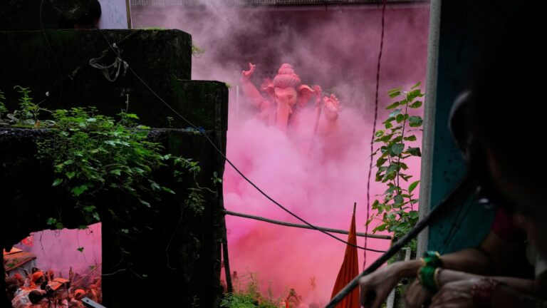 Photos show Indians marking final day of Ganesh Chaturthi that ends with sea immersion