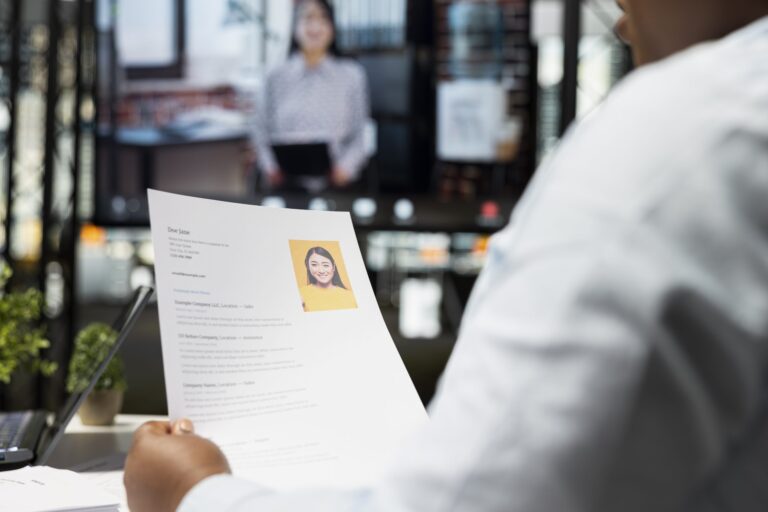 close-up-hr-staff-interviewing-applicant-web-video-conference-office-attending-remote-scaled.jpg
